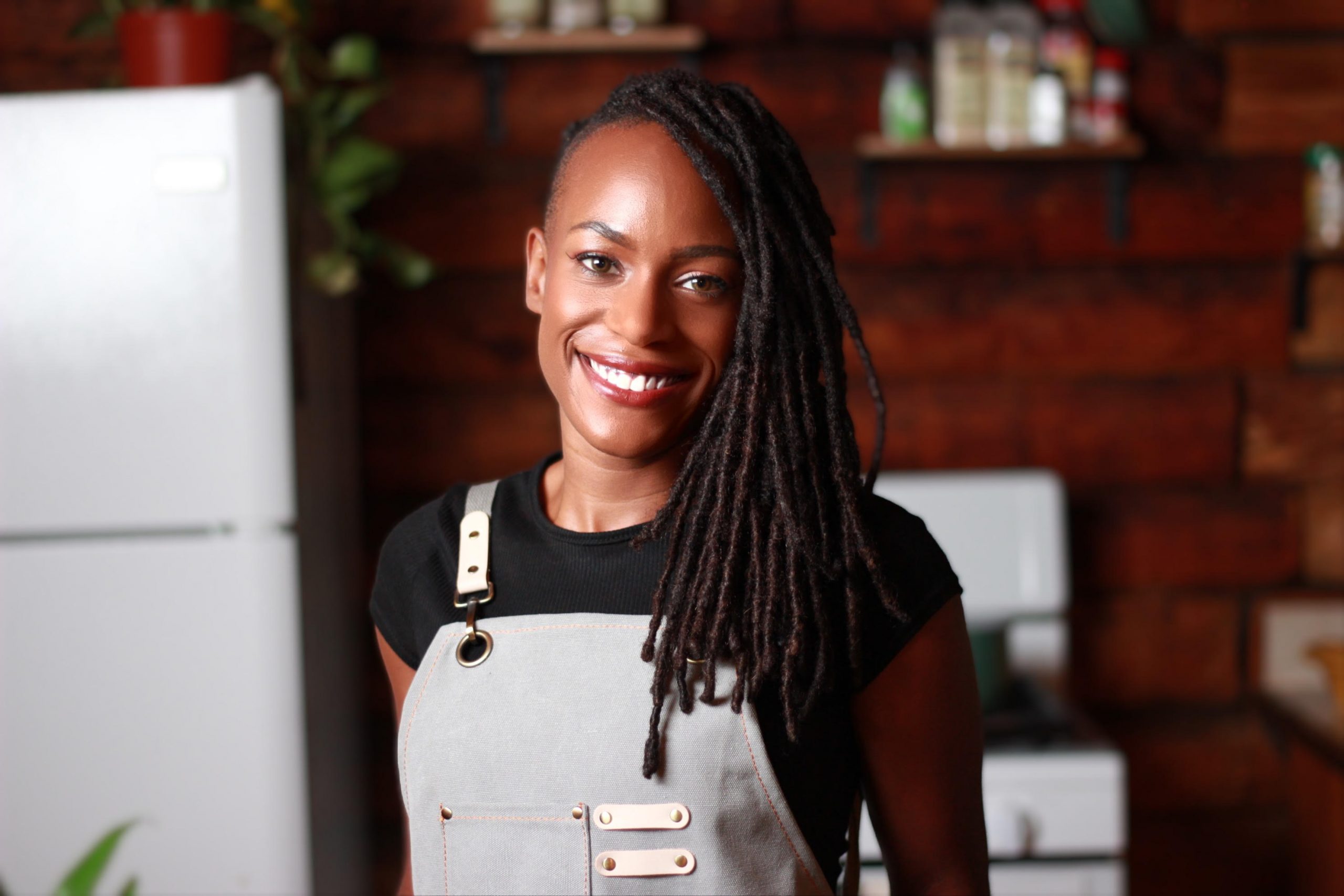 Chef Chrissy Tracey standing in a kitchen