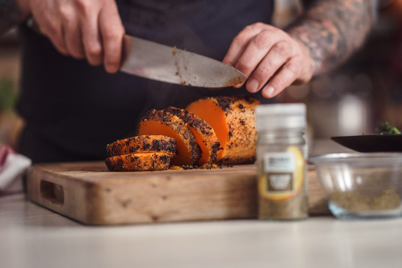 Man slicing Roasted Butternut Squash Tenderloin