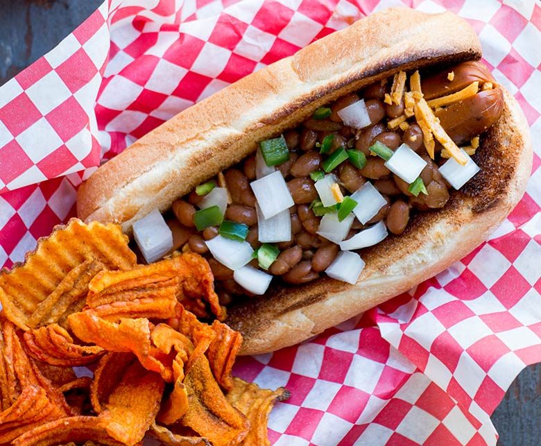 Veggie chilidog with a side of BBQ chips