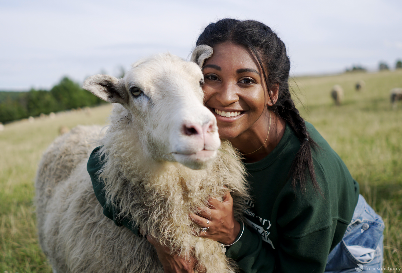 Farm Sanctuary Staff Arianna Duncan with a Sheep